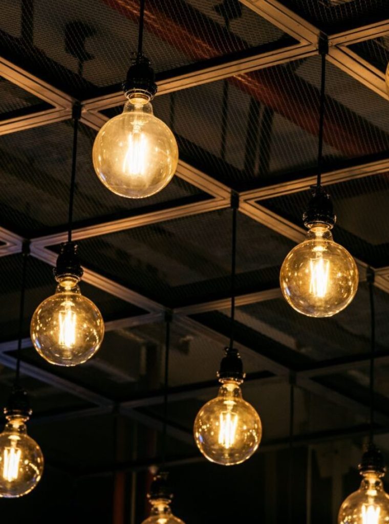Pendant lights with carbon element globes installed in a Monbulk restaurant by our electrician Melbourne